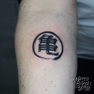 Master Roshi's Turtle Kanji Logo Arm Tattoo