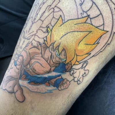 Super Saiyan Goku With Shenron Arm Tattoo