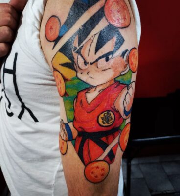 Colored Kid Goku Arm Tattoo