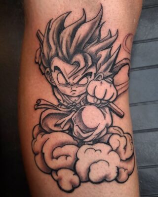 Angry Kid Goku Arm Tattoo