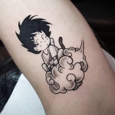 Curious Goku Flying Arm Tattoo